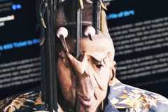 A spaghettified character from MindsEye over negative Steam reviews of the game.